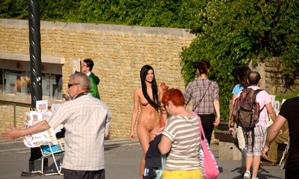Gorgeous brunette nude in public